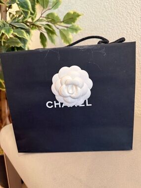 CHANEL Black Small Shopping Bag with White Camellia Accent